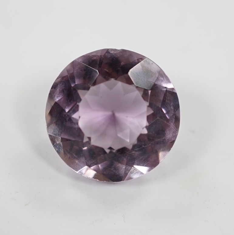 An unmounted round cut amethyst, weighing approximately 15.9ct.